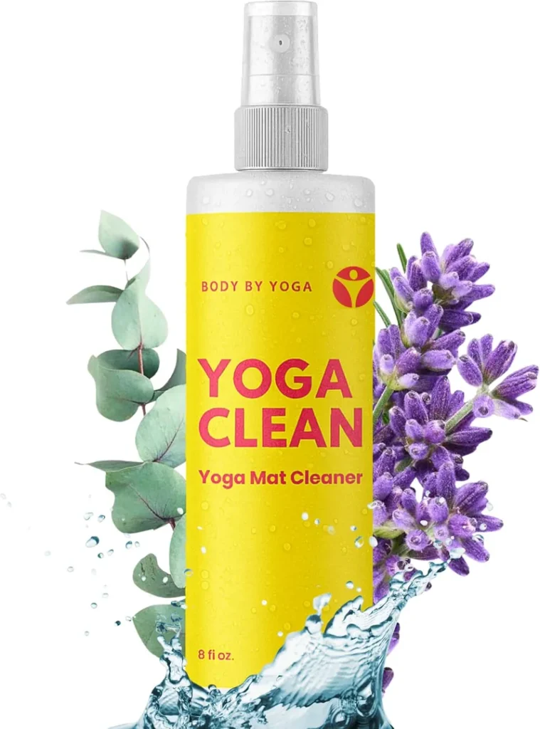 The Body By Yoga yoga mat cleaner spray bottle with lavender beside it.