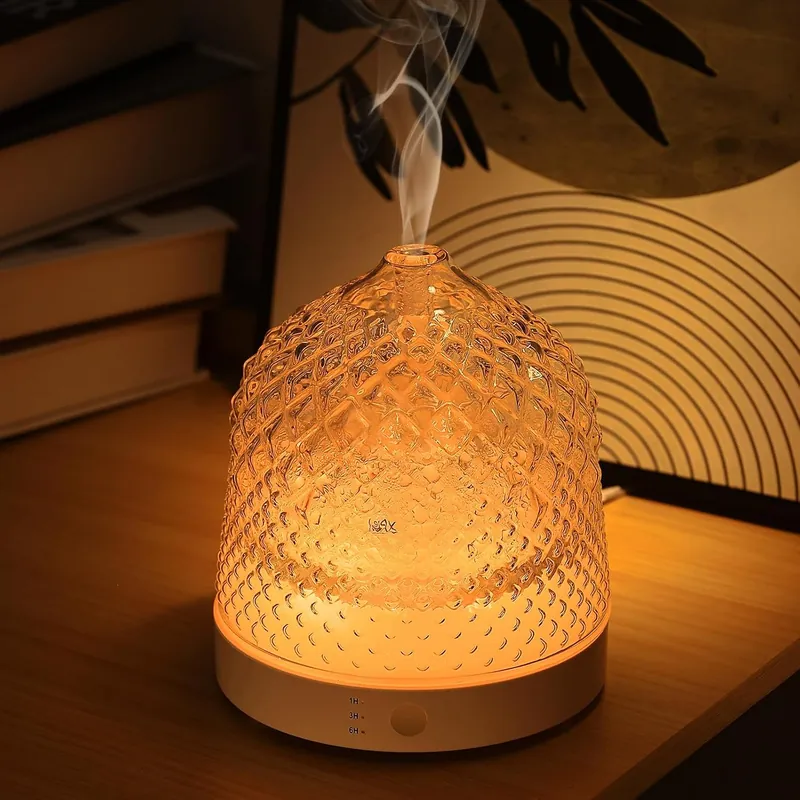 diamond textured glass dome glowing amber over a wooden circular base