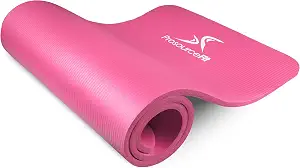 The ProsourceFit extra thick mat in pink stands rolled with its dense half inch foam profile on display.