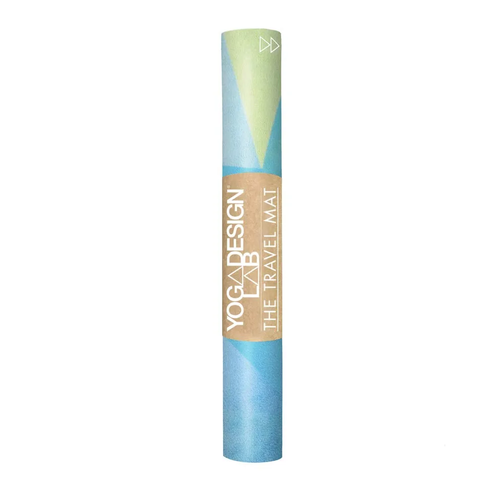 The Yoga Design Lab Combo mat in geo print rides rolled inside its attached sling strap.
